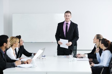 Group of young business people at meeting
