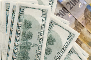 Swiss francs and dollars.