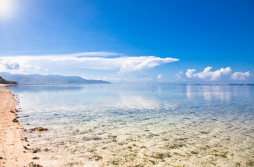 Obraz premium Dramatic cloudy sky on sand beach, Indonesia