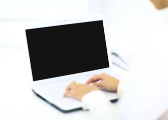 Young business woman in office