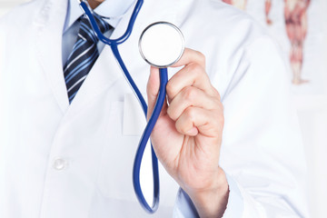 Male Doctor Holding Stethoscope