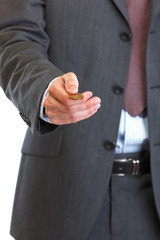 Fototapeta premium Closeup on man throwing up coin