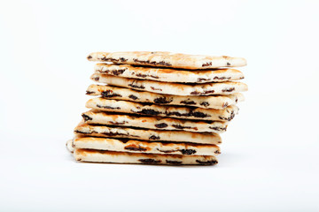 A stack of cookies with caramel filling on a white background.
