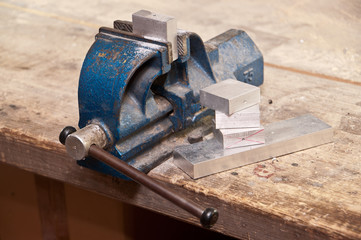 Vice with a block of metal