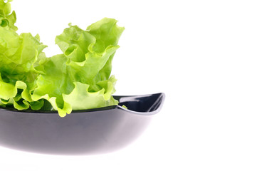 Fresh green salad isolated on white background