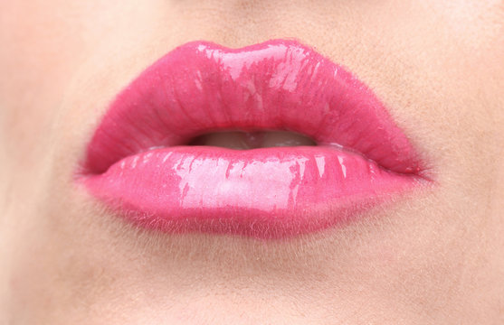 beautiful make up of glamour pink gloss lips