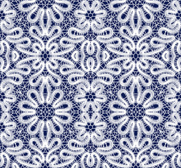 Beautiful white lace on blue background
