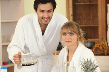 Man serving his girlfriend coffee