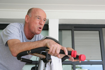 Elderly man working out