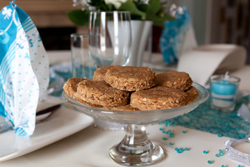 Stack of whole grain biscuits with decorated table set