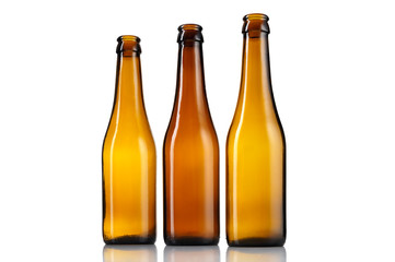 Three empty bottles of beer isolated