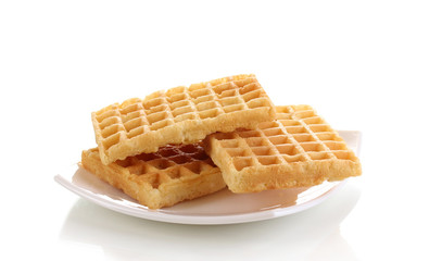 Sweet waffles on plate isolated on white