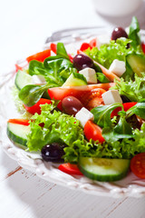 Obraz na płótnie Canvas Mediterranean-Style salad with Feta and Olives