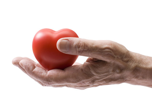 Old Hand With Red Heart. Clipping Path Included.