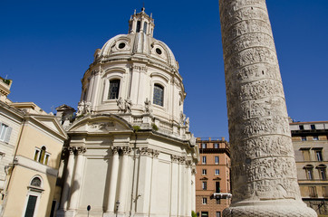 Fototapeta na wymiar Trajan column and church in Rome, Italy