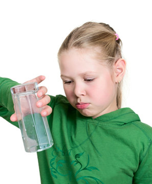 Girl With An Empty Glass Isolated On White