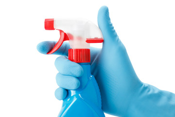 blue gloved hand  with cleaning spray bottle with plastic dispen