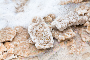 crystalline salt on beach of Dead Sea