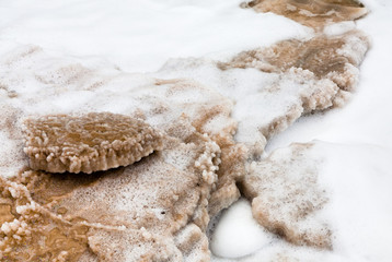 crystalline salt on beach of Dead Sea