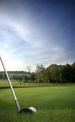 chipping a golf ball onto the green
