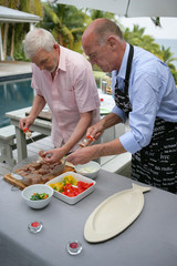 seniors making a barbecue