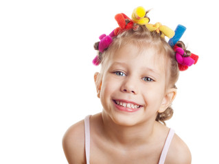 A girl in hair curlers