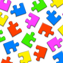 Colored puzzle pieces on white background