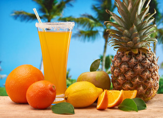 orange juice in a glass on a table