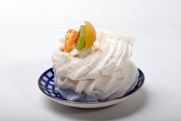 sweet cake with fruits isolated on white