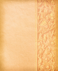 Old worn paper with decorative ornament