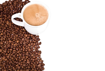 a cup of coffee and roasted coffee beans