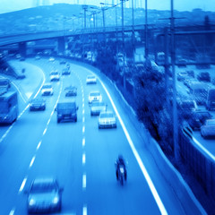 an image of cars on the road