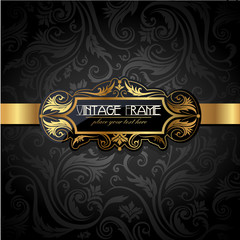 Vintage gold frame on black floral background.