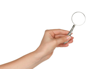 Hand with magnifying glass