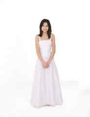 Fototapeta na wymiar Beautiful young teen girl in white dress or gown, isolated on wh
