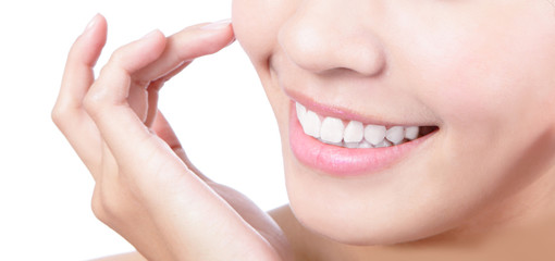 Obraz premium Close up a smiling mouth of the girl