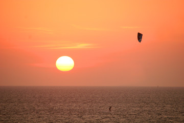 kitesurfer at sunset