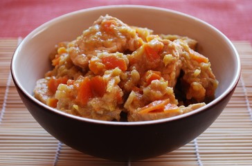 Stew tempeh with carrots, leeks and soy sauce in a bowl