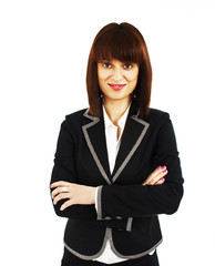 Confident young business lady standing with folded hand