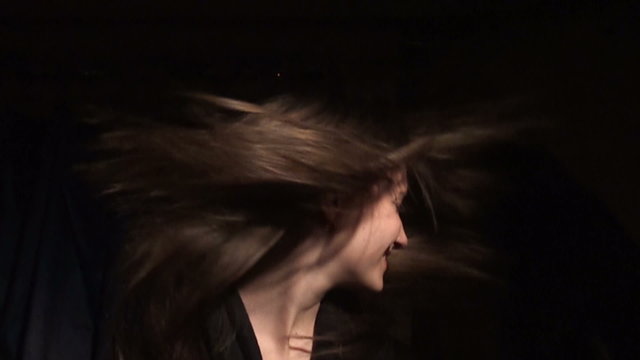 Beautiful girl shakes her hair