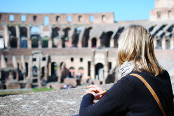 Girl visting the Colosseum