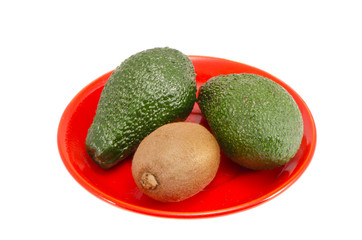 isolated plate with avocado and kiwi fruit