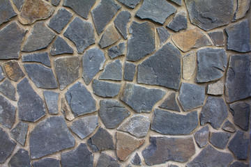 Mit Steinen verzierte Wand