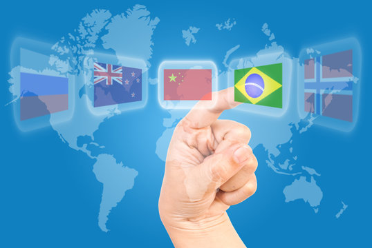 Hand pushing Brazil flag for Social Network.