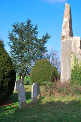 ruined church with gravestones