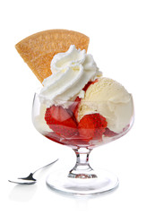 Ice cream with strawberries and whipped cream
