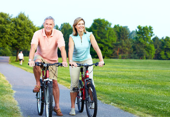 Obraz premium Senior couple cycling.