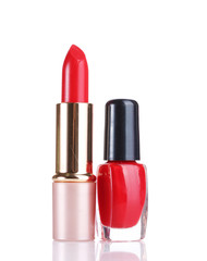 red lipstick and nail polish isolated on white