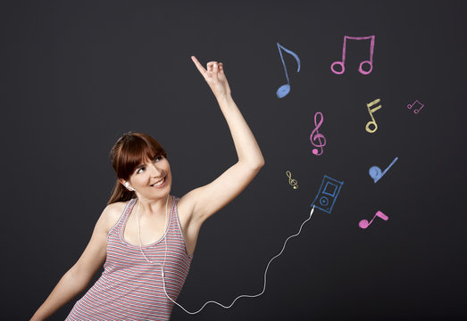 Girl dancing with musical notes