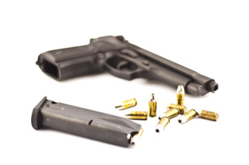 Pistol & bullets isolate.